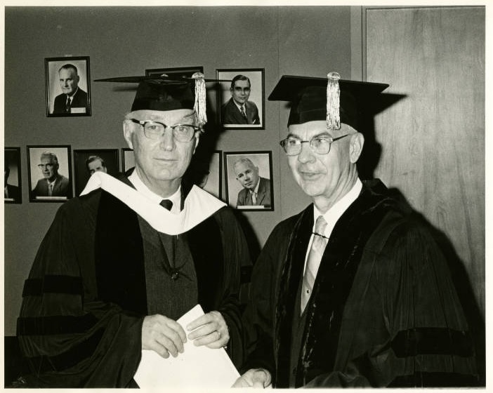 1970s-80s_Photograph of Albert Outler and Bishop Paul William Milhouse at Southern Methodist Unversity commencement ceremonies, Dallas, May 25, 1969 